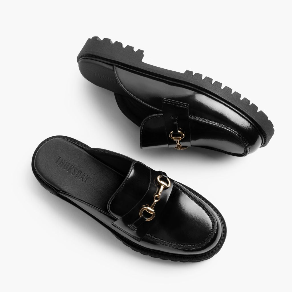 High-Traction Rubber Outsole & Lug Tread Pattern on Penny Mule Zwart & Gold Leren loafers voor Dames