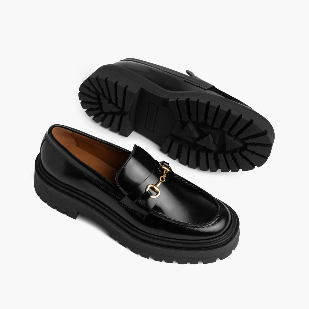 High-Traction Rubber Outsole & Lug Tread Pattern on Penny Platform Zwart & Gold Leren loafers voor Dames