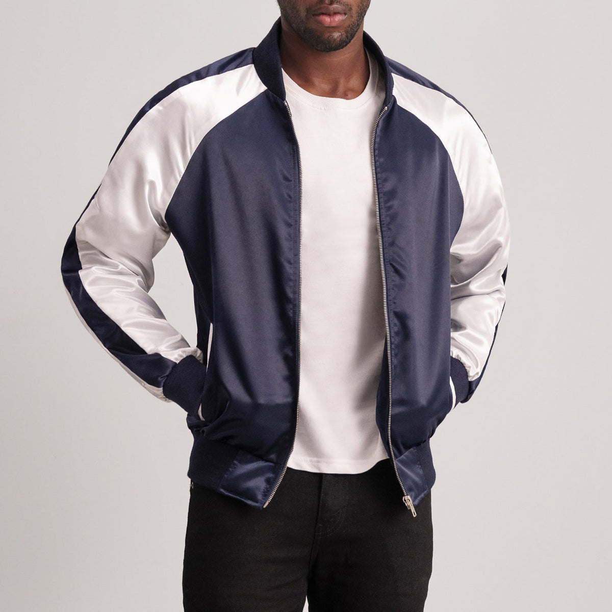 Clarke Blauw Varsity Leren Jas voor Heren - Lateral Side Profile View Showing Sleeve Cut &amp; Athletic Taper Fit