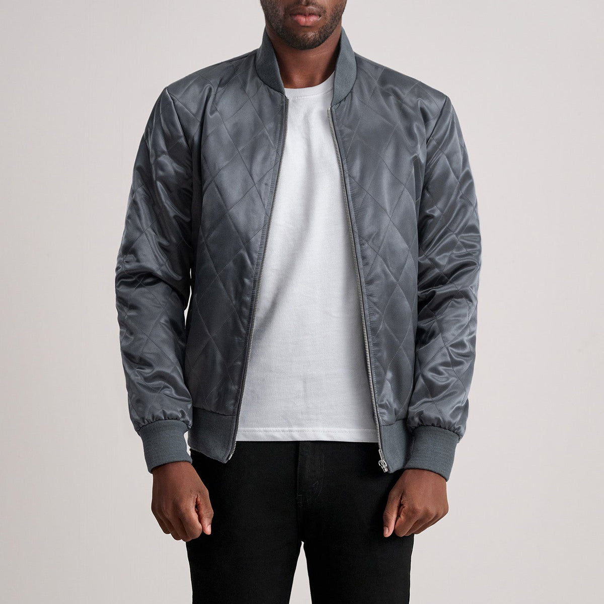 Danson Gewatteerd Grey Varsity Leren Jas voor Heren - Lateral Side Profile View Showing Sleeve Cut &amp; Athletic Taper Fit