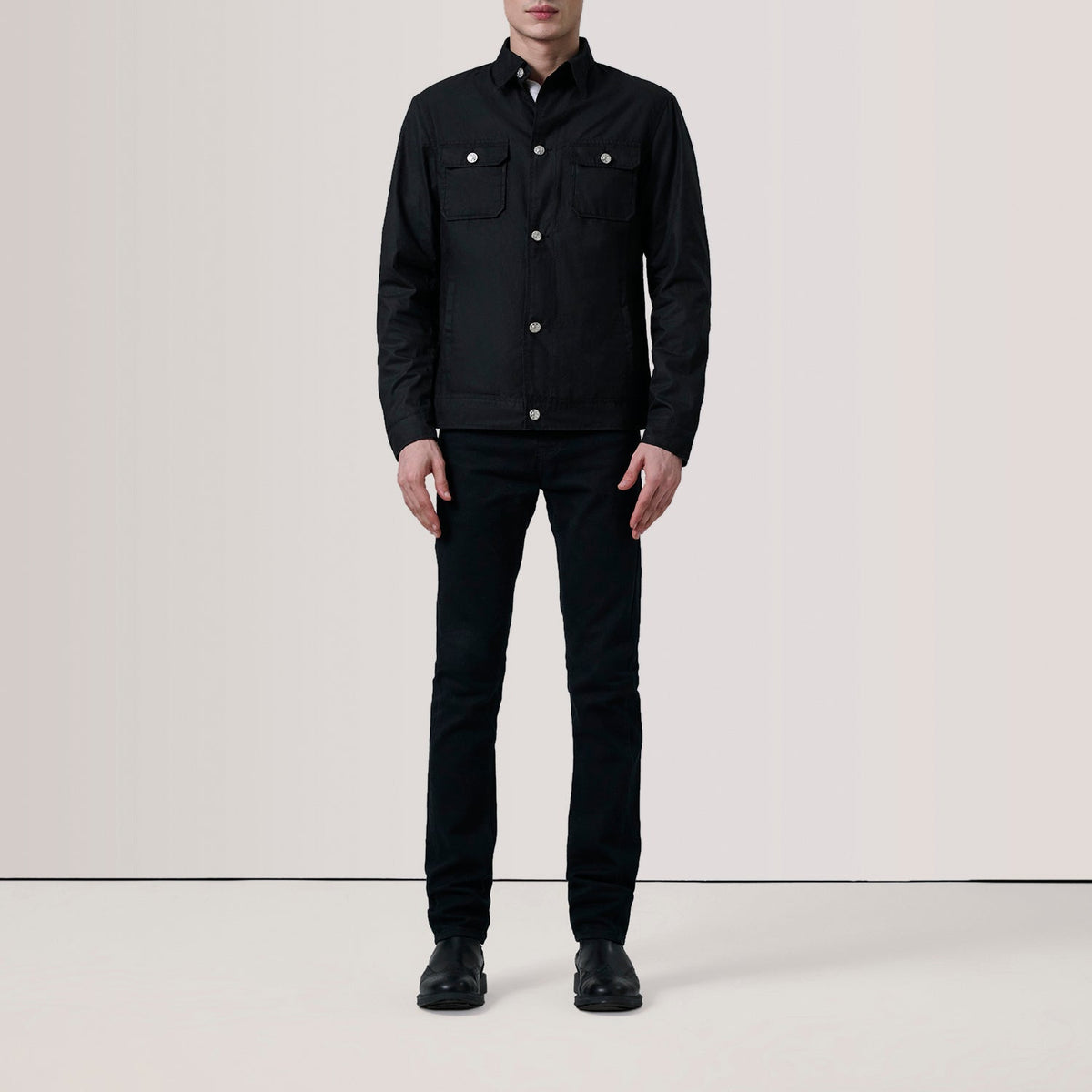 
Black Waxed Cotton Canvas Leather Jacket - Achteraanzicht met getailleerde schouders & strakke zoom