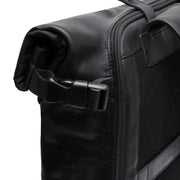 
Solid Antique Brass Hardware & Heavy-Duty Dual Zipper Detail on Bornholm Volnerfleer Roll-top Backpack