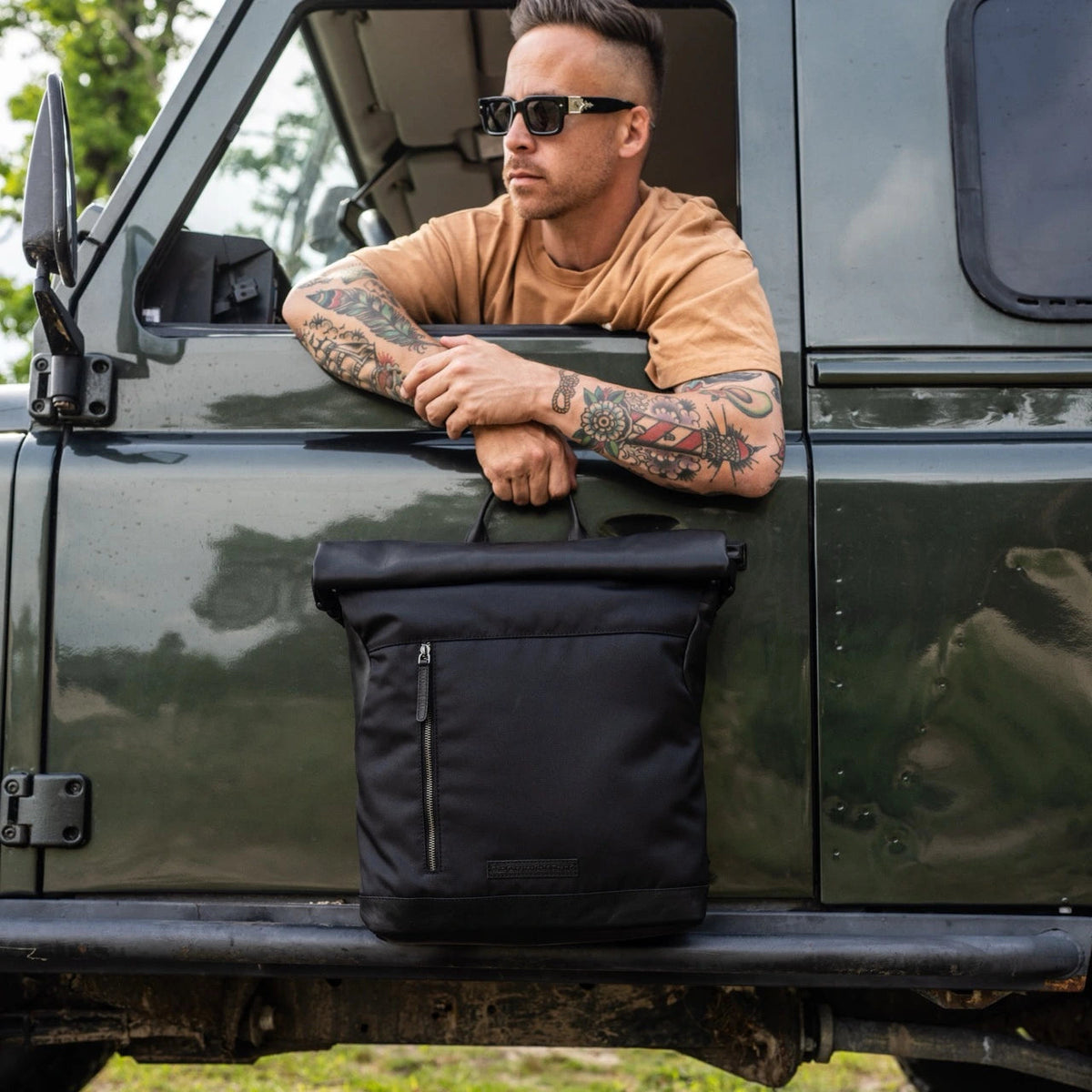 
Bornholm Volnerfleer Roll-top Backpack - Gestructureerd zijprofiel met vouwdiepte & volume