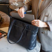 
Solid Antique Brass Hardware & Heavy-Duty Dual Zipper Detail on Osira Leren shopper