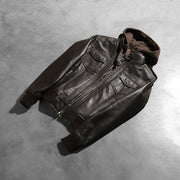 
Gedragen perspectief van Roslyn Brown Hooded Leather Bomber Jacket op model - Natuurlijke valling bij daglicht