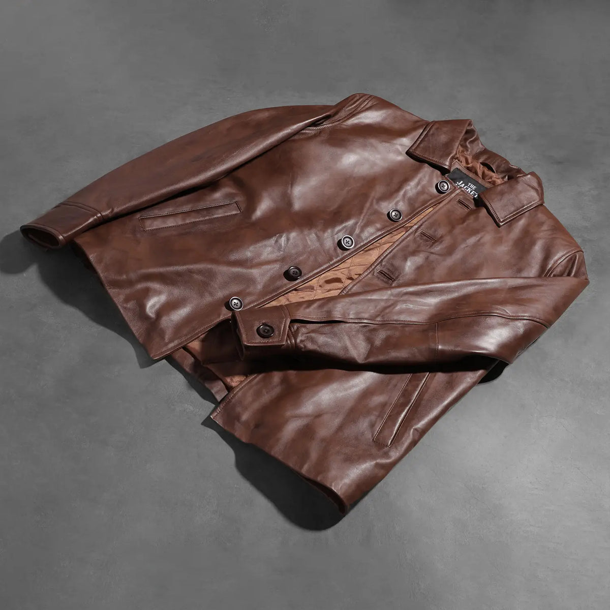 Buttoned &amp; Hem Craftsmanship Construction Detail on Waffle Bruin Leren Jas voor Heren